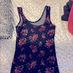This is a nice tank top with flowers and polkadots good for summer.